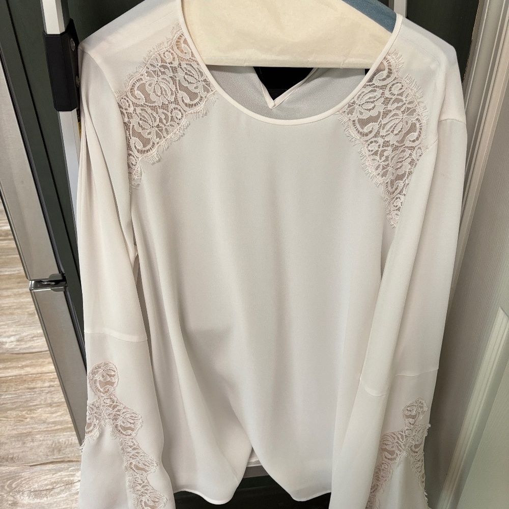 BCBG Max Asia blouse. White with lace accents